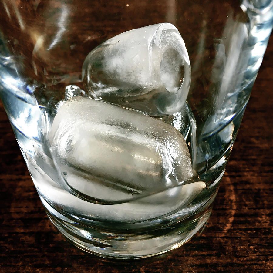 Ice cubes in a glass Photograph by Tom Gowanlock