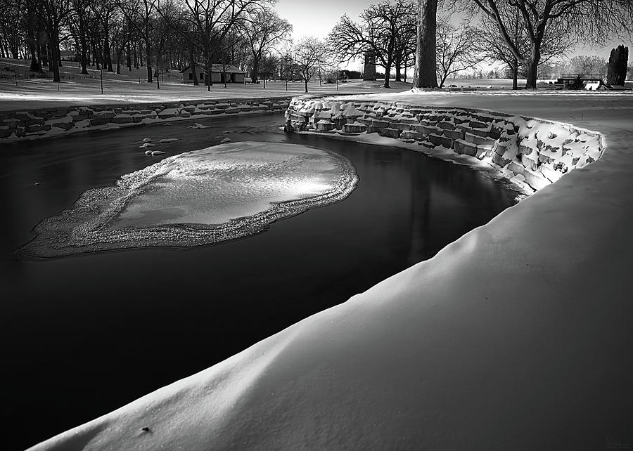 Ice Island on Allen Creek at Lake Leota Park in Evansville WI Photograph by Peter Herman