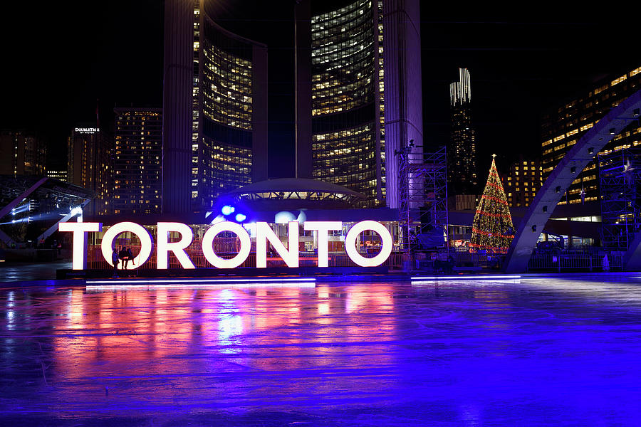 Ice Rink At Nathan Phillips Square At Night With City Hall And T Photograph By Reimar Gaertner