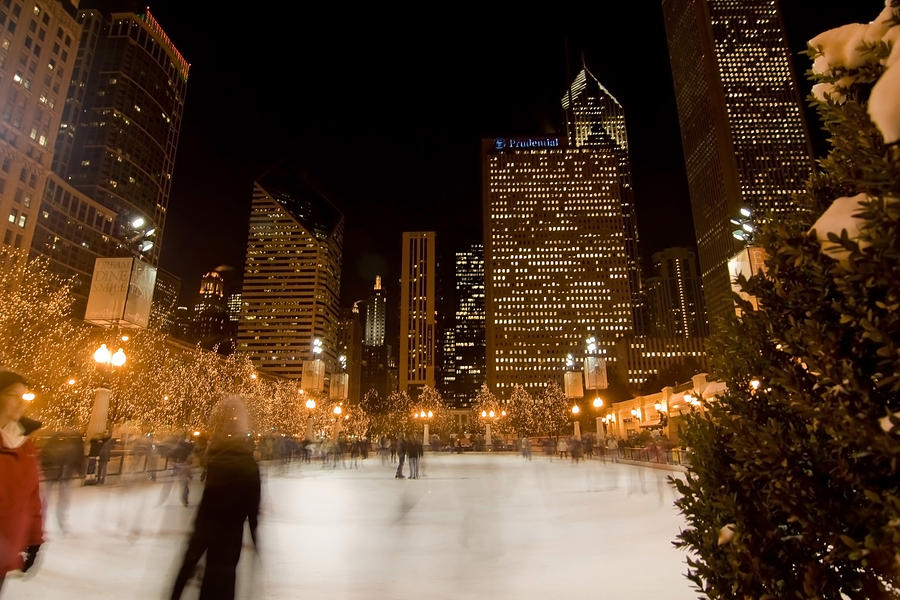 Ice Skaters and Chicago Skyline Photograph by Sven Brogren