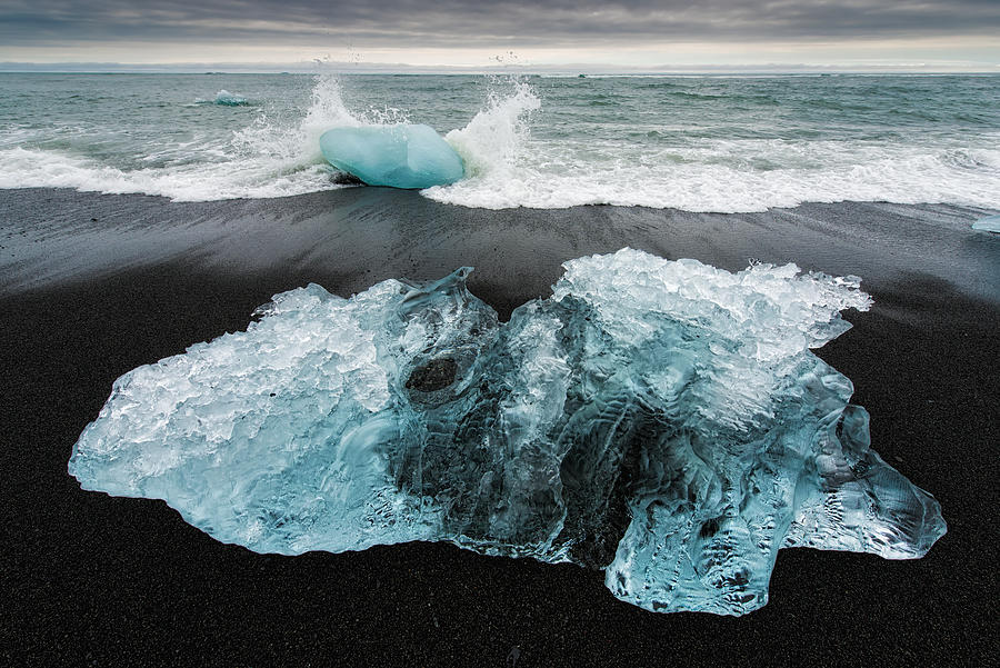 Iceberg and black beach in Iceland Photograph by Matthias Hauser