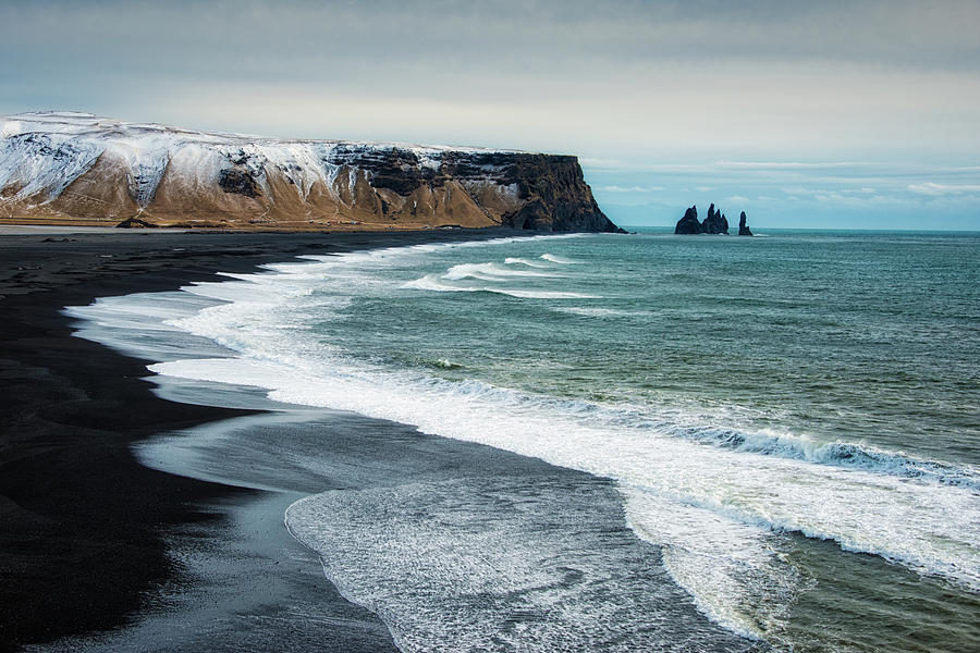 Iceland Reynisfjara black beach and ocean Photograph by Matthias Hauser