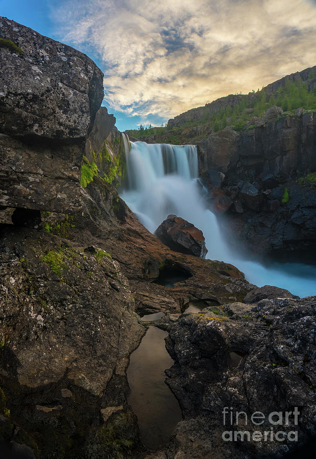 Iceland Waterfall Amongst The Rocks Photograph