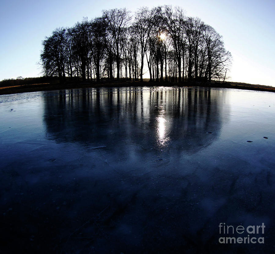 Icy lake Photograph by Cristina Rettegi
