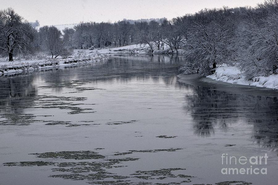 Icy river reflections Photograph by Laurie Wilcox