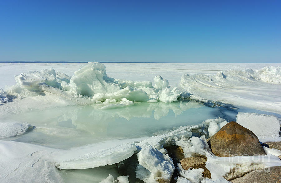 Icy sculptures on Lake Simcoe Photograph by Les Palenik