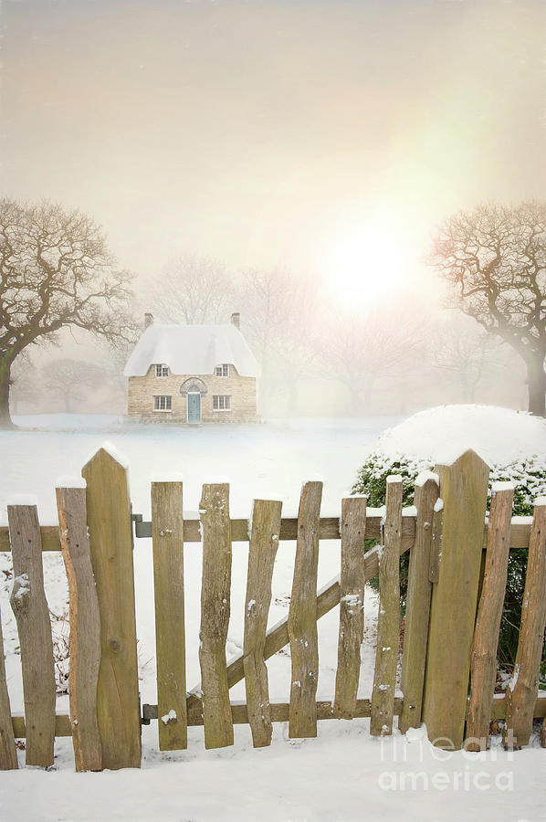 Idyllic Cottage In Winter Snow At Sunset Photograph by Lee Avison