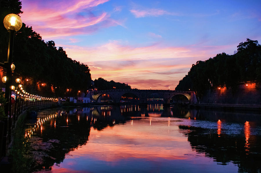 Sunset Photograph - Impressions Of Rome - Divine Sky and a Necklace of Lights Along Tiber River by Georgia Mizuleva