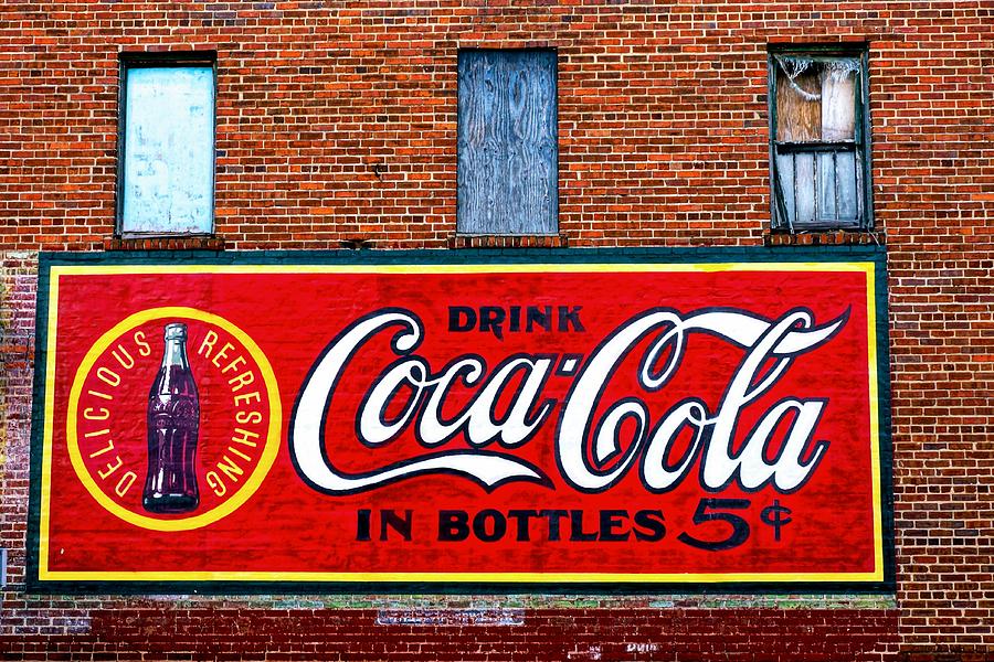 In Bottles Photograph by Rodney Lee Williams