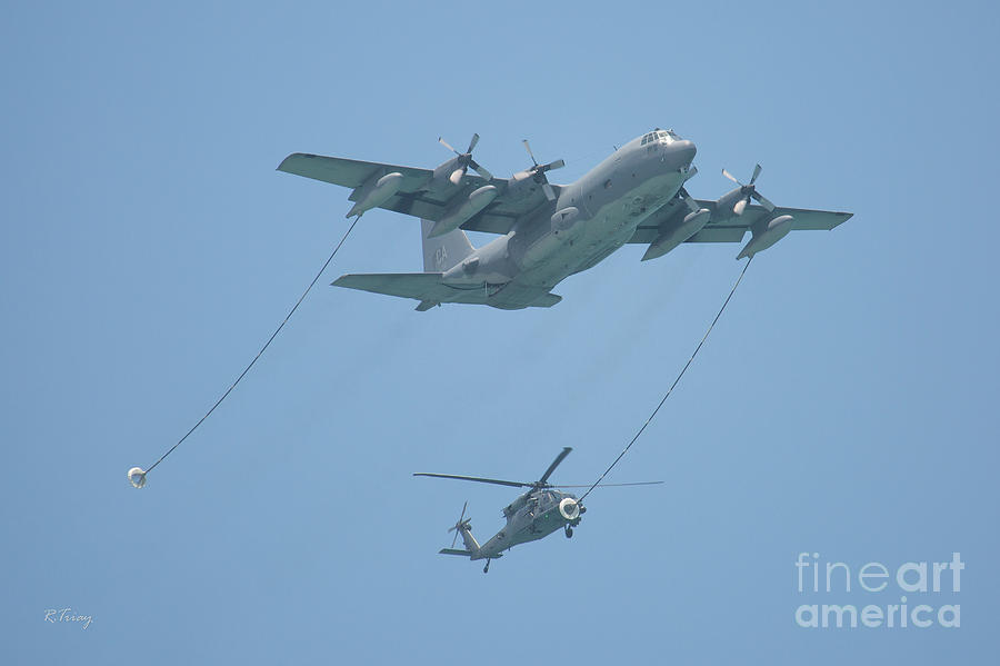 In Flight Refueling of a Sikorsky Blackhawk Helicopter. Photograph by Rene Triay FineArt Photos