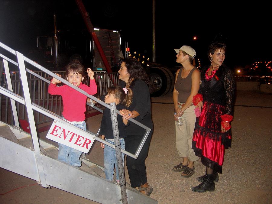 In line to go on a ride traveling carnival Tombstone Arizona 2004 Photograph by David Lee Guss