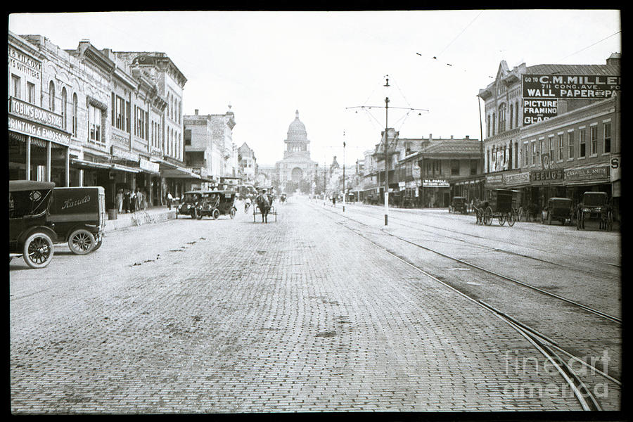 In this historical 1913 photo, horse drawn carriages in downtown Austin Photograph by Dan Herron