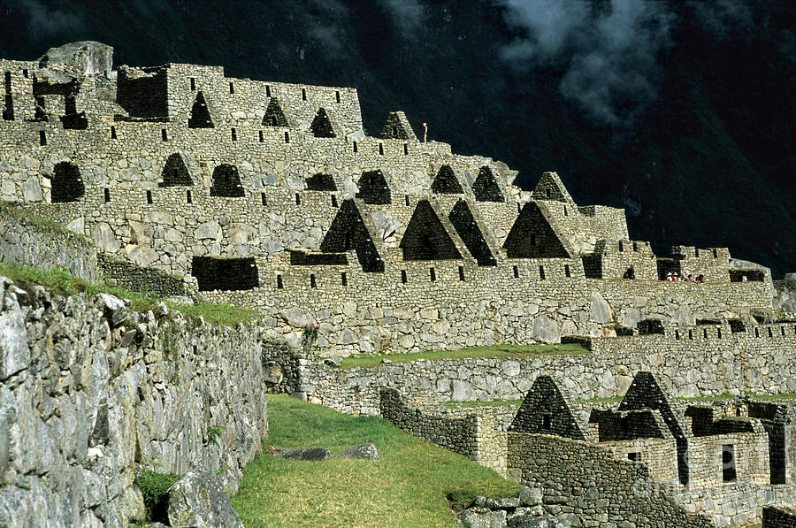 Inca houses at Machu Picchu Photograph by James Brunker