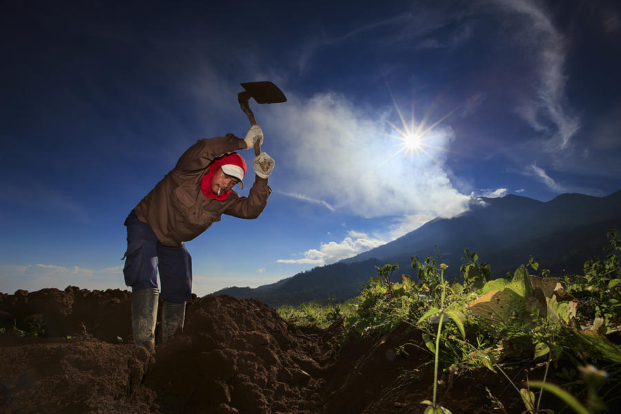 Indonesian Farmer Photograph by Andy Akbar