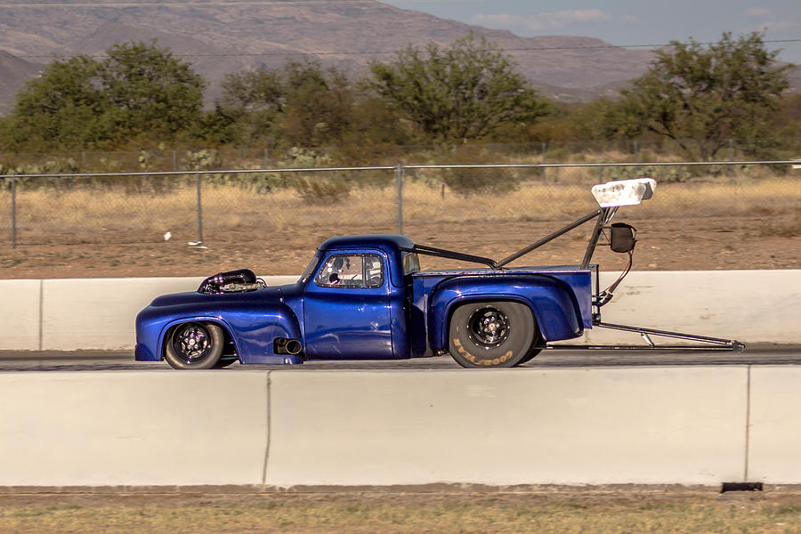 Insane Ford truck drag Photograph by Darrell Foster