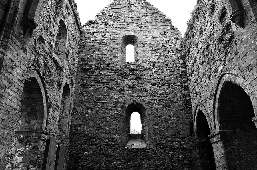 Inside Jerpoint Abbey Irish Medieval 12th Century Ruins County Kilkenny Ireland Black and White Photograph by Shawn OBrien