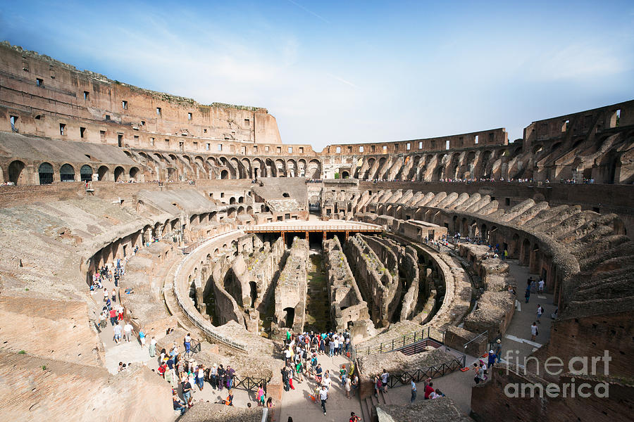 Interior of the Colosseum with tourists - Rome - Italy Photograph by Matteo Colombo