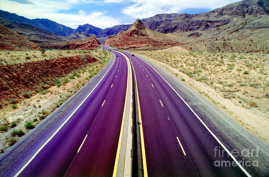 Interstate Highway I-15 through the magical desert mountains Photograph by Wernher Krutein
