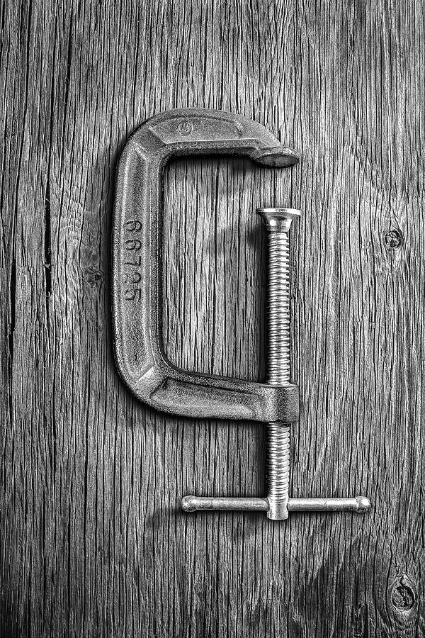 Iron C-Clamp on Plywood 68 in BW Photograph by YoPedro