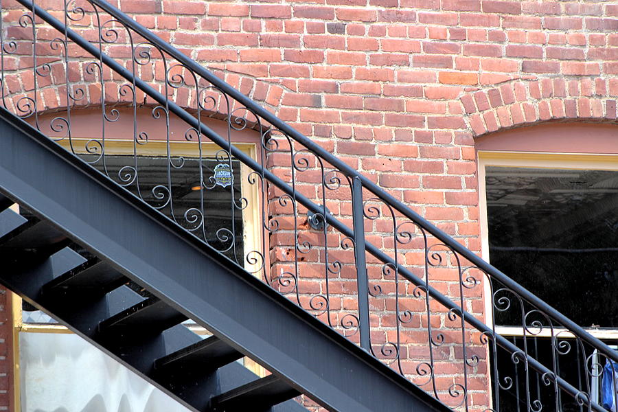 Iron Stairs On Brick Building In Colorado Photograph by Colleen Cornelius