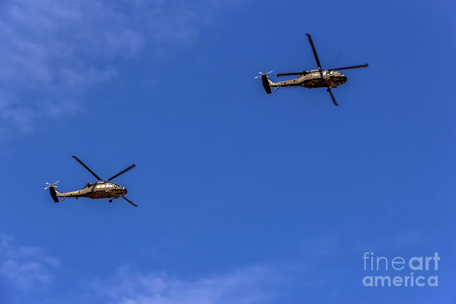 Iroquois Helicopters In The Blue Photograph by Jon Burch Photography