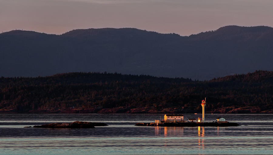 Isolated Lighthouse Photograph by Ed Clark