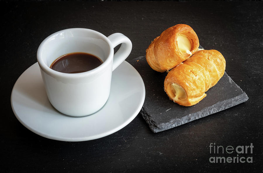 Italian breakfast. Cannoncini and espresso Photograph by Marina Usmanskaya