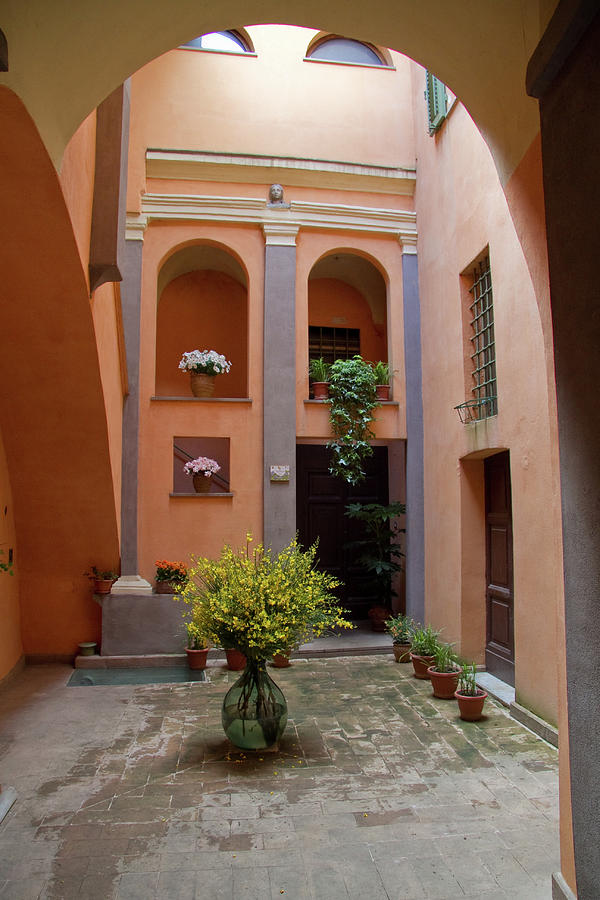 Italian Courtyard Photograph by Roger Mullenhour