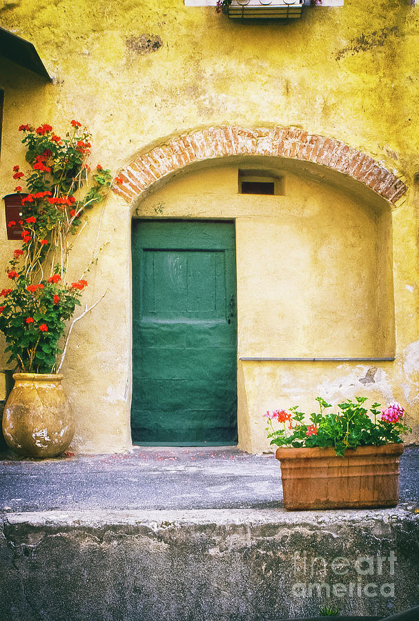 Architecture Photograph - Italian facade with geraniums by Silvia Ganora