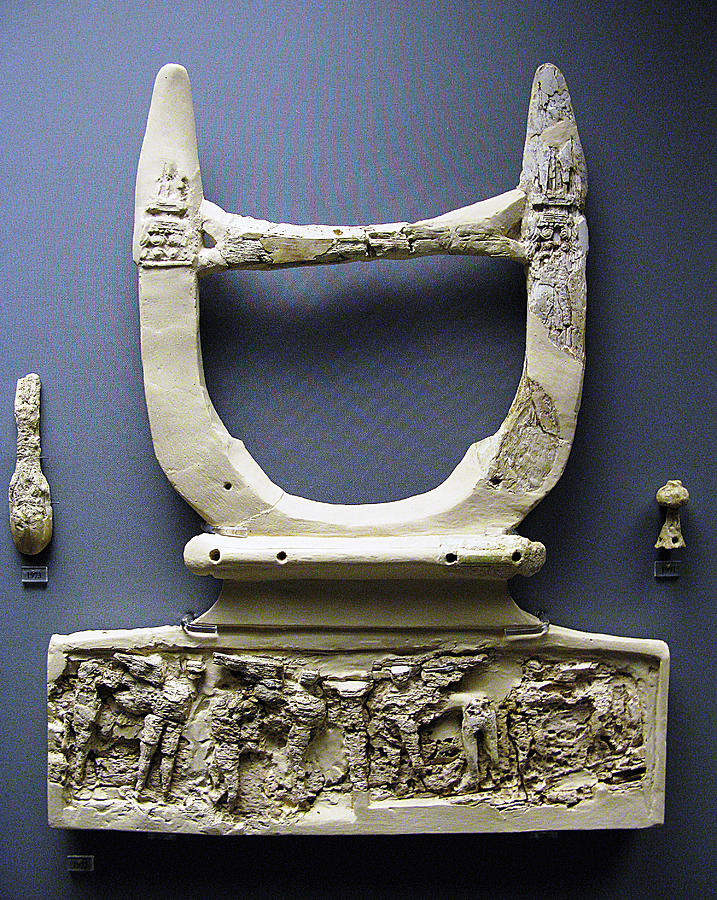 Ivory lyre Photograph by Andonis Katanos