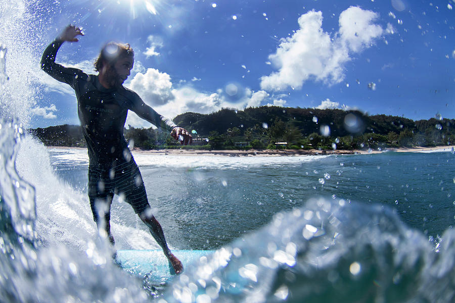 Jack Johnson Surfing. Photograph by Sean Davey