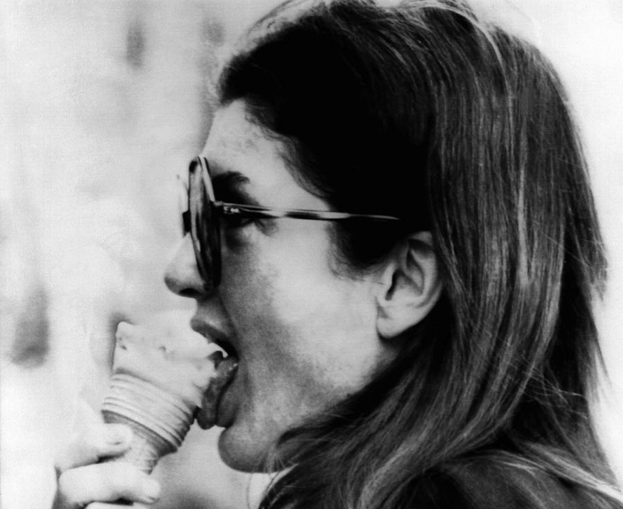 Jacqueline Kennedy Onassis Licks An Ice Photograph by Everett