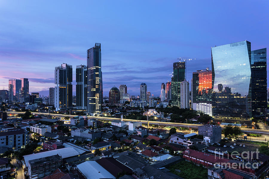Jakarta sunrise over modern skyline Photograph by Didier Marti