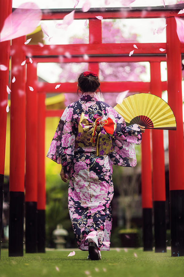Japan lady in kimono walk in the temple Photograph by Anek Suwannaphoom