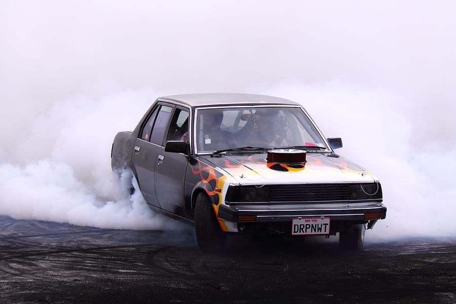 Japanese car with V8 doing burnout Photograph by Stephen Athea - Pixels