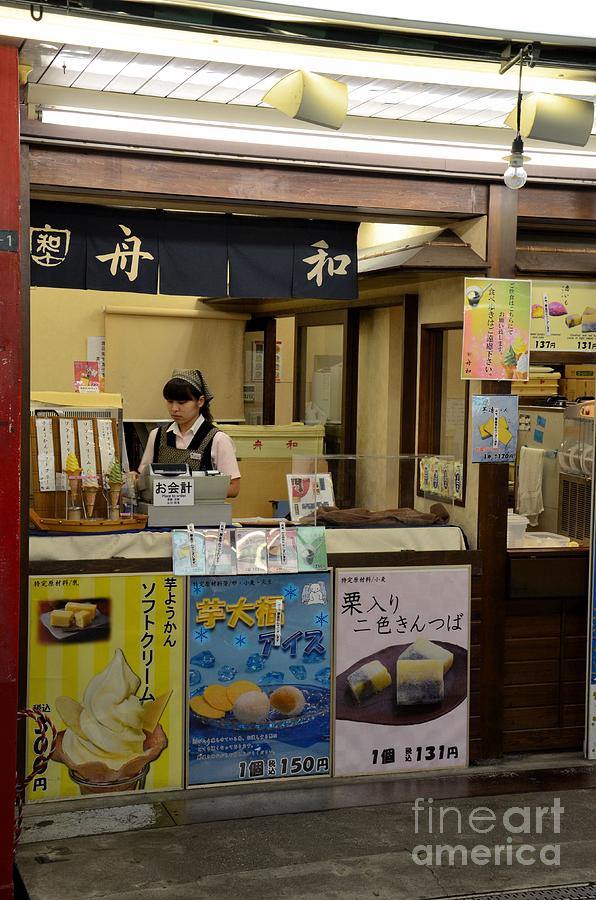 Japanese ice cream dessert stall with female counter staff in Tokyo Japan Photograph by Imran Ahmed