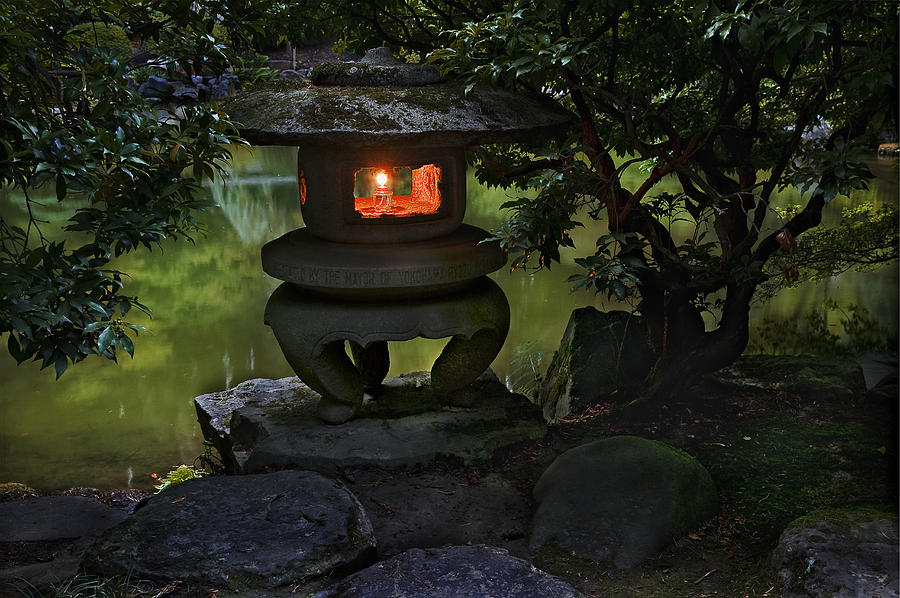 Japanese Lantern at the edge of the pond Photograph by John Christopher