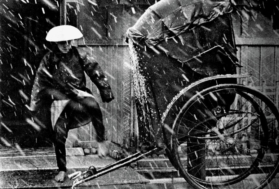 Japanese Rickshaw In The Sleet And Rain Photograph