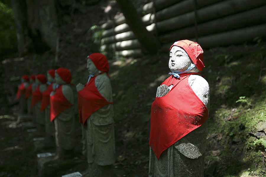 Japanese statues Photograph by Marcus Best
