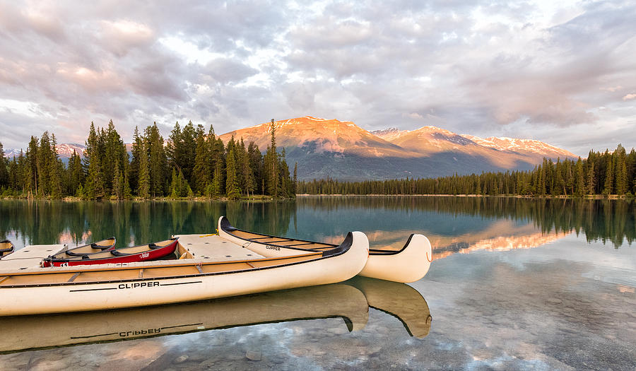 Jasper Lake Photograph - Jasper Lake canoes by John Johnson