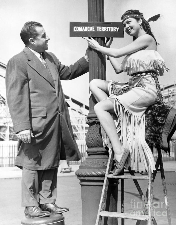Jeanna Carmen Puts Sign On Post With Thomas H. Tesaurao. Photograph by Barney Stein Jeanna Carmen Puts Sign On Post With Thomas H. Tesaurao. Photograph by Barney Stein