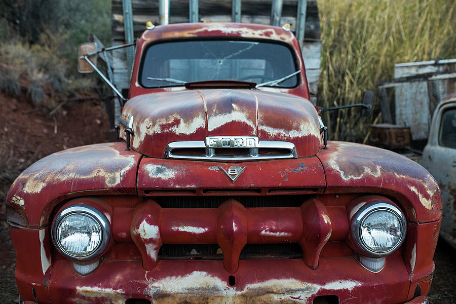 Jerome, AZ Junk Yard Ford V8 Red old Rusty Truck Photograph by Toby McGuire