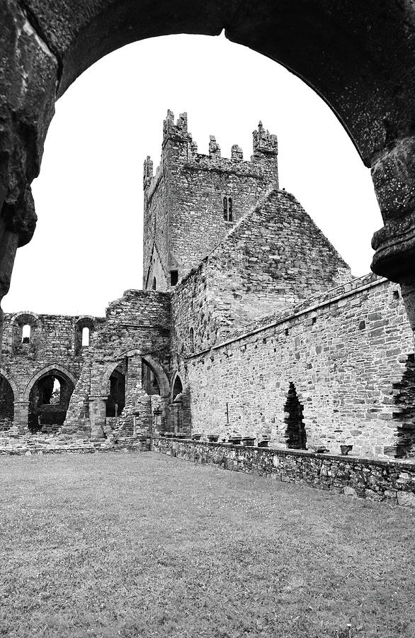 Jerpoint Abbey Church Tower Under Cloister Arch County Kilkenny Ireland Black and White Photograph by Shawn OBrien