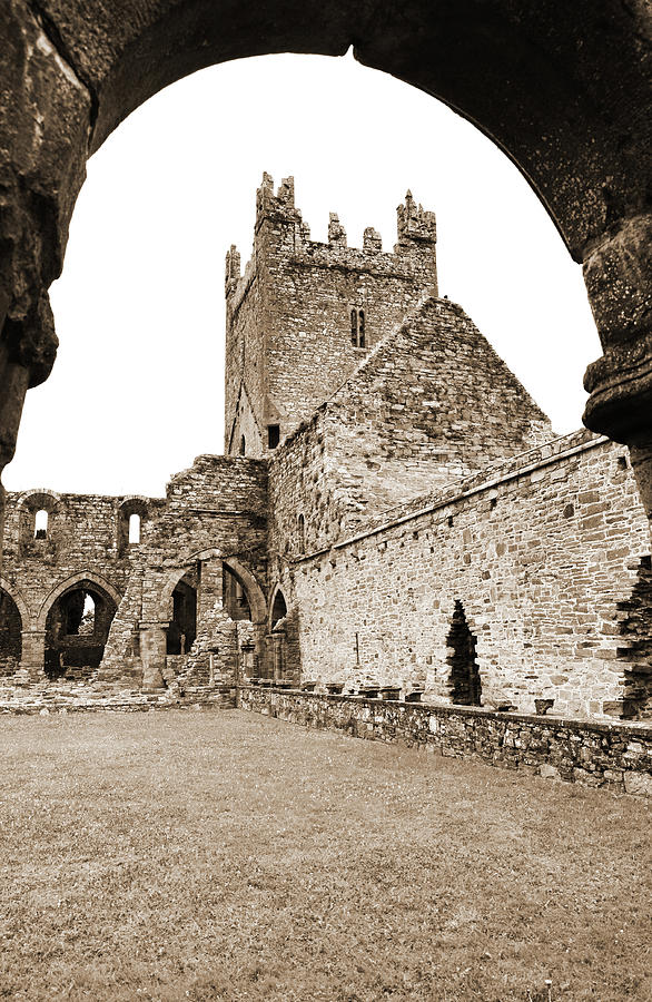 Jerpoint Abbey Church Tower Under Cloister Arch County Kilkenny Ireland Sepia Photograph by Shawn OBrien