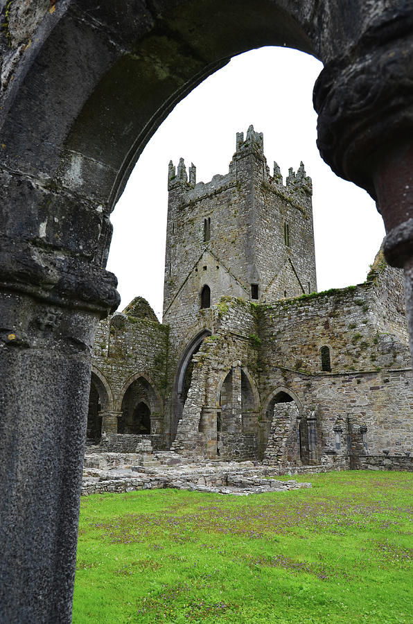 Jerpoint Abbey Ruins Ireland Tower and Arched Cloister Column County Kilkenny Photograph by Shawn OBrien