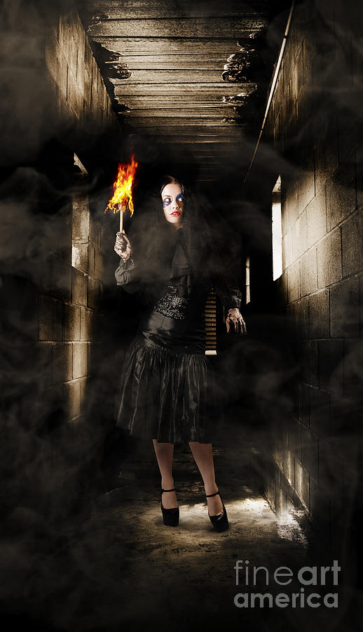 Jester woman in fear walking haunted castle halls Photograph by Jorgo Photography