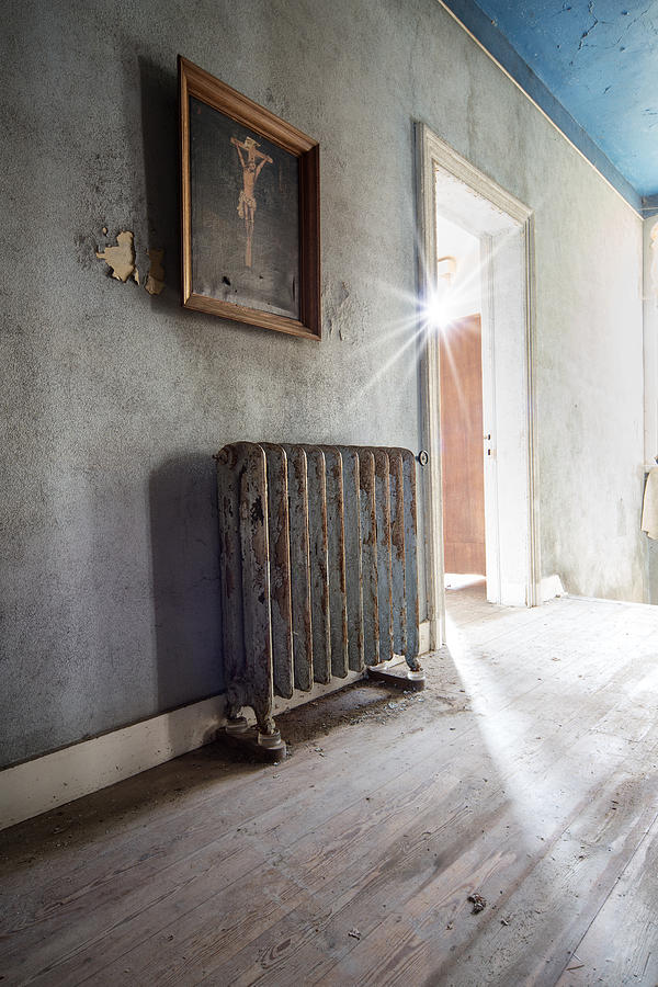 Jesus above the heater - abandoned building Photograph by Dirk Ercken