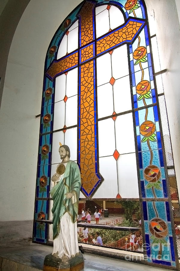 Jesus in the church window and school girls in the background Photograph by Sven Brogren