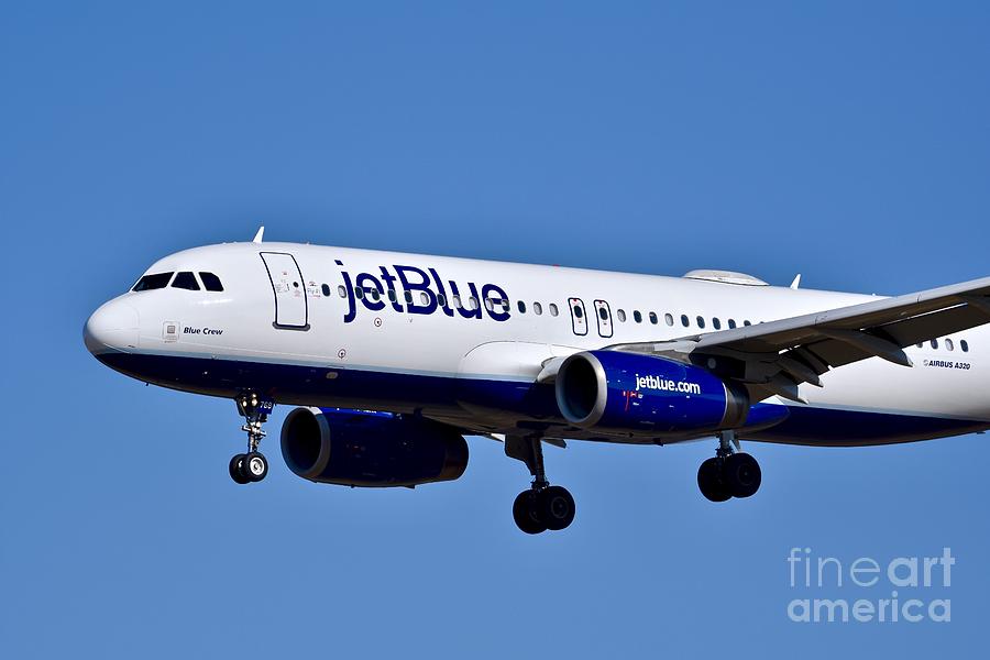Transportation Photograph - jetBlue Airlines plane in flight by JL Images