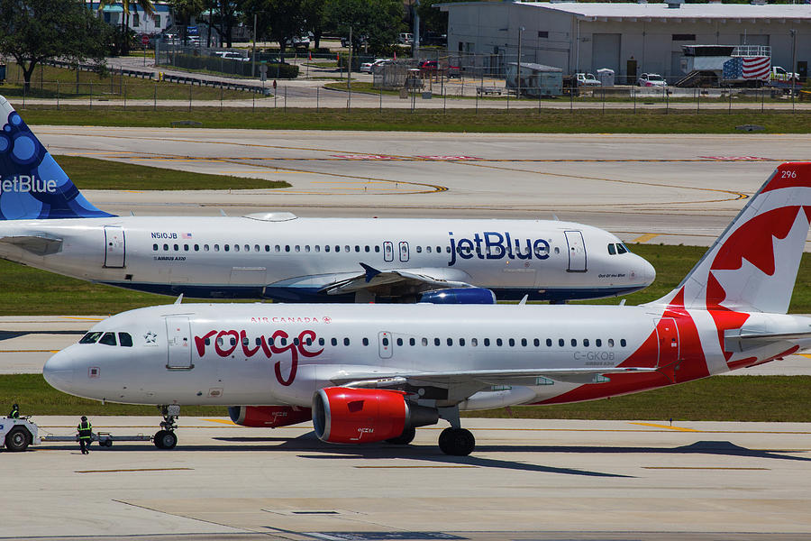 Jetblue and Rouge Airliners Photograph by Dart Humeston